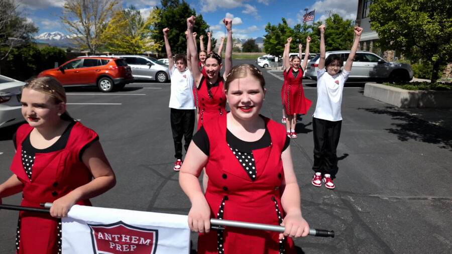 Dancers from the Anthem Prep dance team practice before they perform at the D-Day Memorial parade in Normandy, France, on June 6.