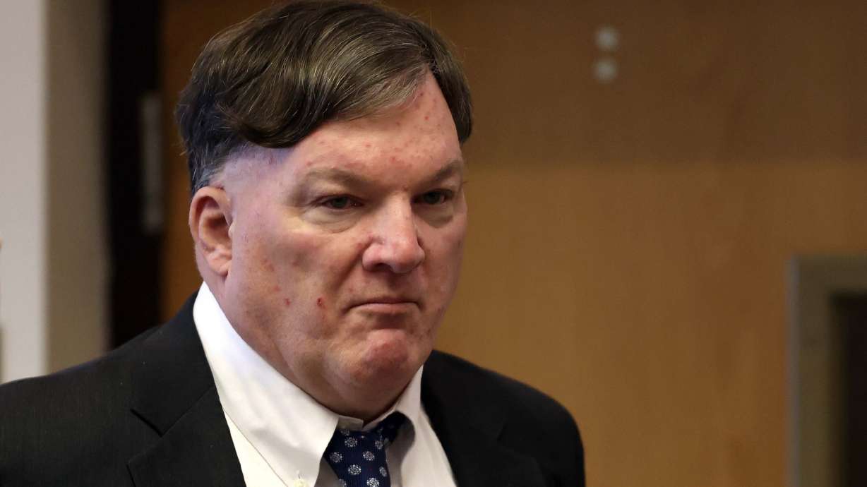 Alleged Gilgo serial killer Rex Heuermann appears inside Judge Tim Mazzei's courtroom on Feb. 6 in Riverhead, N.Y. Heuerman, previously accused of killing four women, was charged Thursday in the deaths of two more.