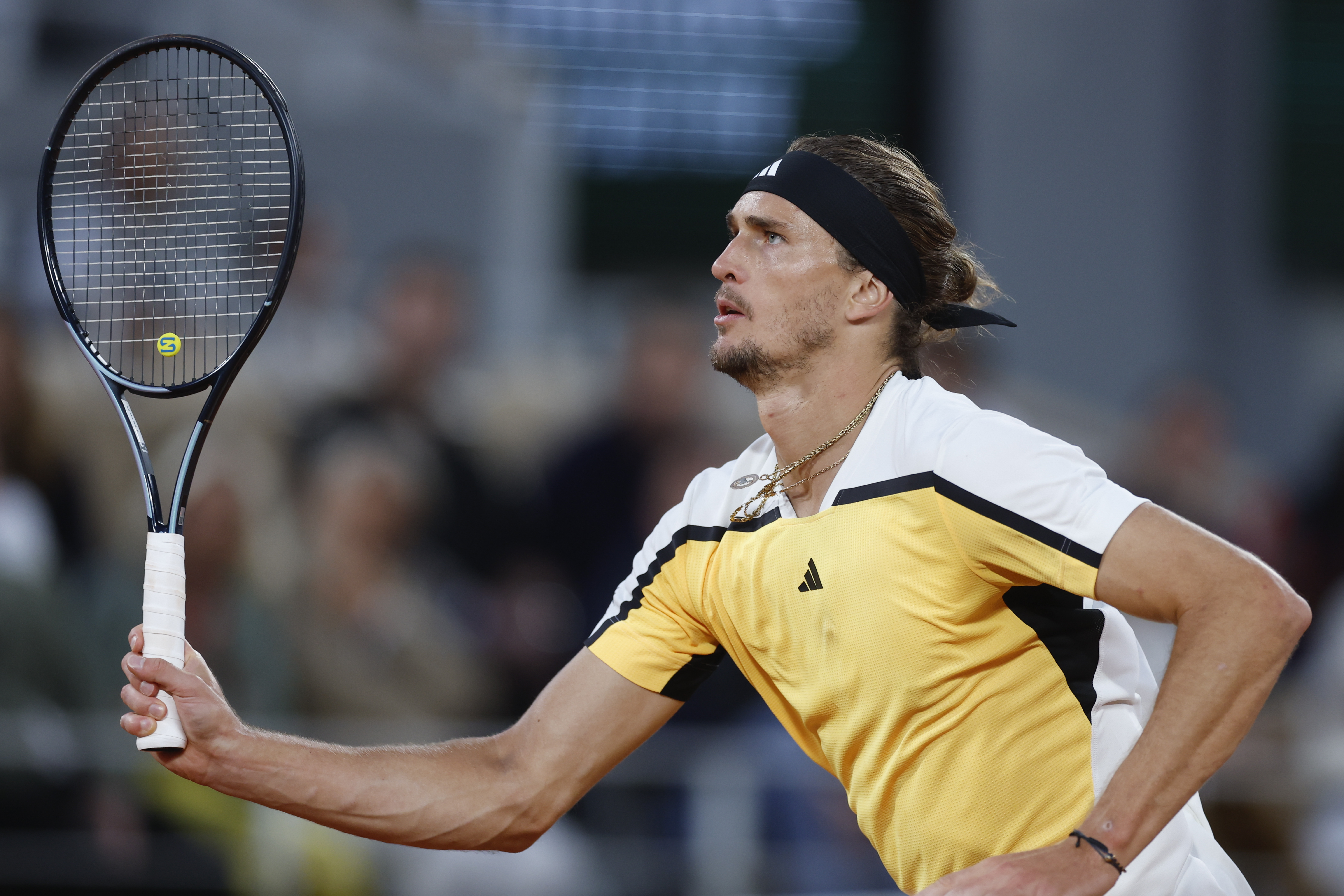 Germany's Alexander Zverev runs to play a shot against Australia's Alex De Minaur during their quarterfinal match of the French Open tennis tournament at the Roland Garros stadium in Paris, Wednesday, June 5, 2024. 