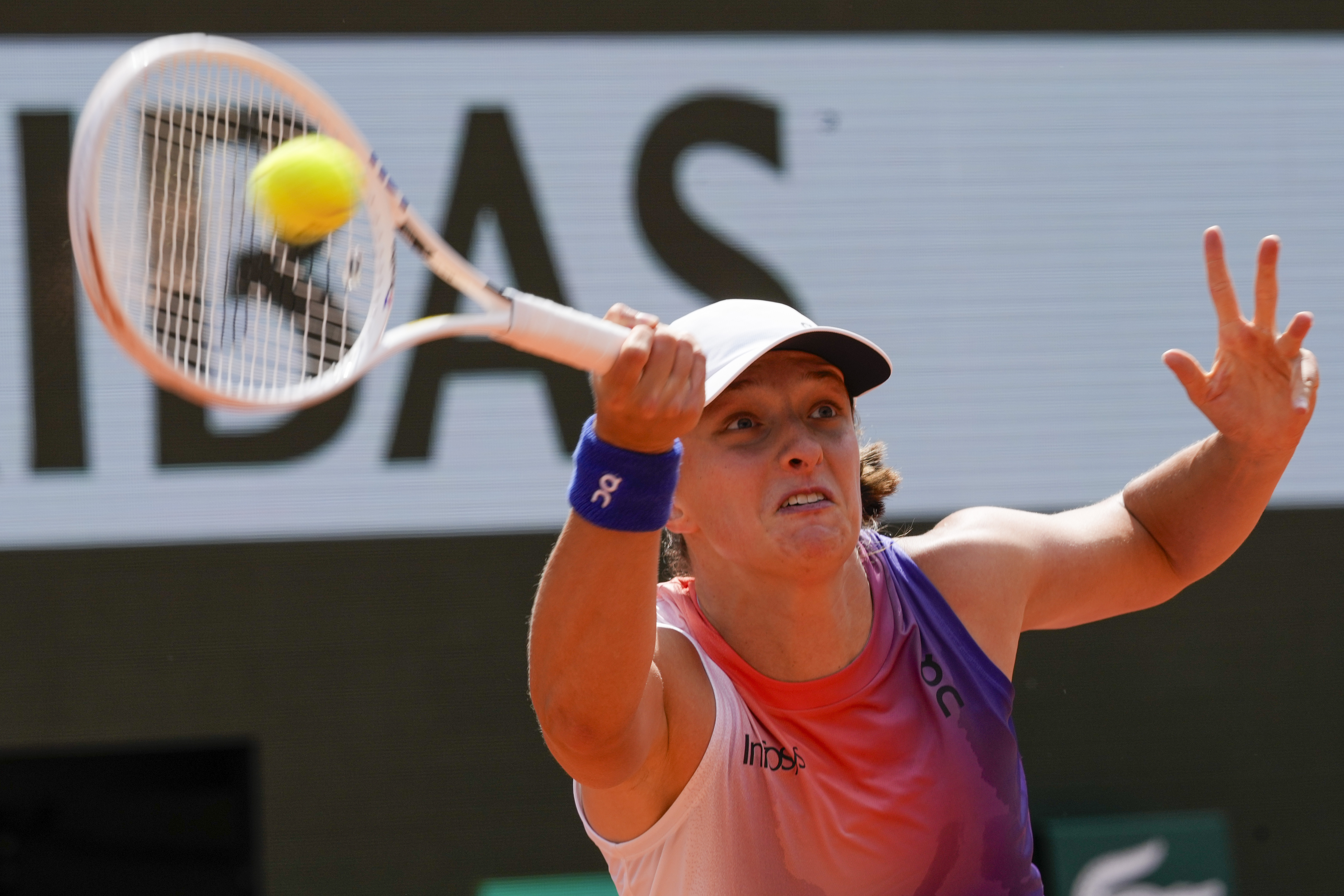 Poland's Iga Swiatek plays a shot against Coco Gauff of the U.S. during their semifinal match of the French Open tennis tournament at the Roland Garros stadium in Paris, Thursday, June 6, 2024.