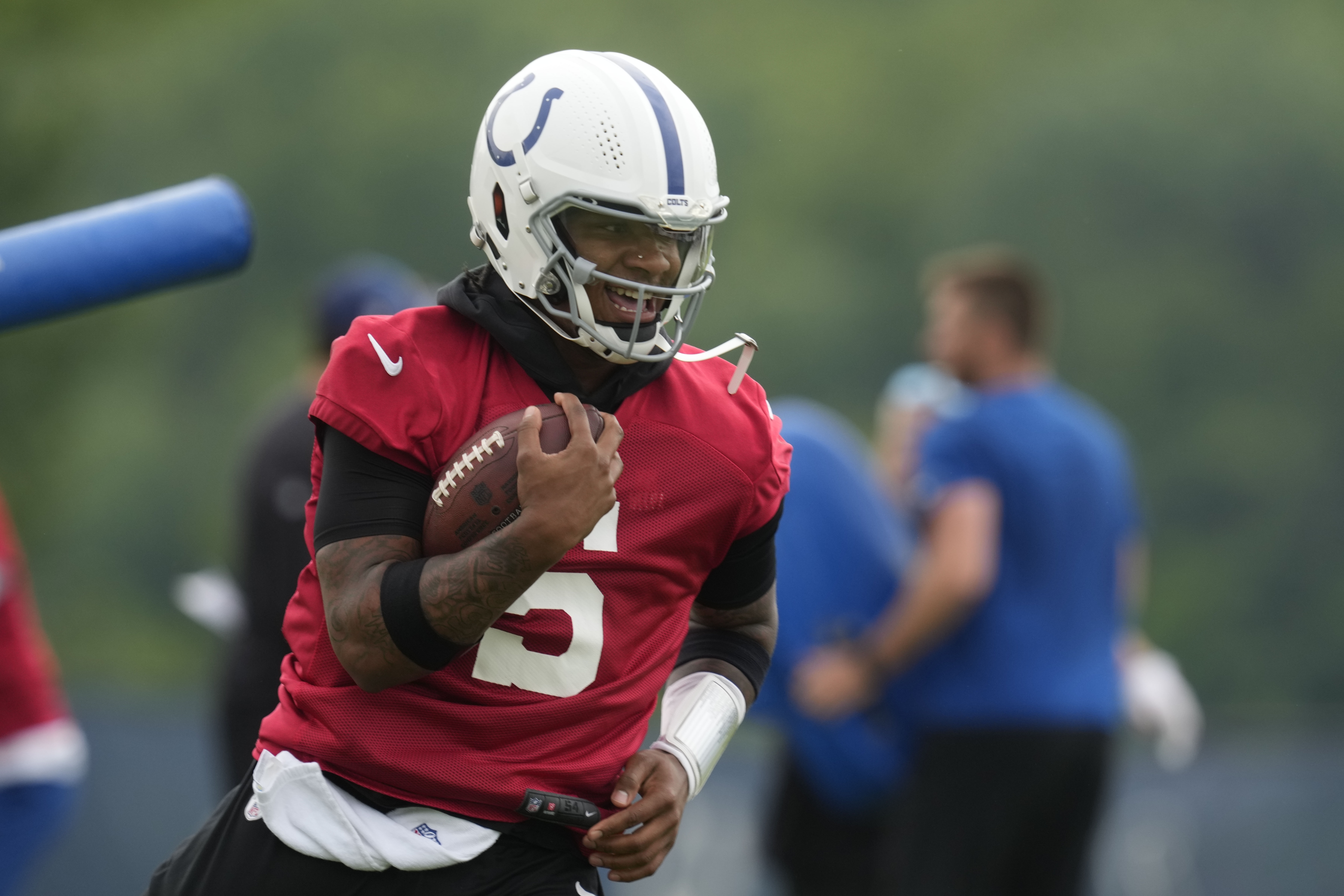 Indianapolis Colts quarterback Anthony Richardson runs a drill during NFL football practice at the team's headquarters Wednesday, June 5, 2024, in Indianapolis. 