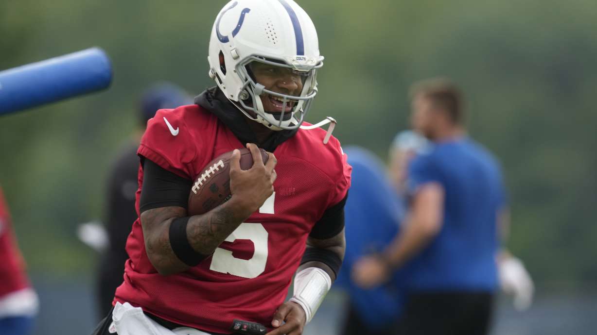 Indianapolis Colts quarterback Anthony Richardson runs a drill during NFL football practice at the team's headquarters Wednesday, June 5, 2024, in Indianapolis.