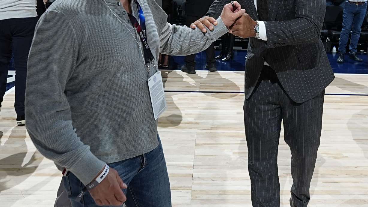 Minnesota Timberwolves minority owners Marc Lore, left, and Alex Rodriguez celebrate after Game 7 of an NBA second-round playoff series against the Denver Nuggets, Sunday, May 19, 2024, in Denver.
