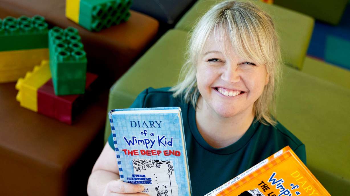 Kim Christensen, librarian at Springville Library, is 1 of 8 librarians nationwide who was selected to meet Jeff Kinney, author of the internationally bestselling "Diary of a Wimpy Kid" series. Christensen was photographed at the Springville Public Library on Thursday.