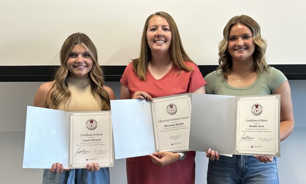 From left, Beaver residents Meranda Martin, Brailee Eyre and Caprie McNeill received recognition from the American Red Cross, St. George, Wednesday for acting quickly to save a man's life.