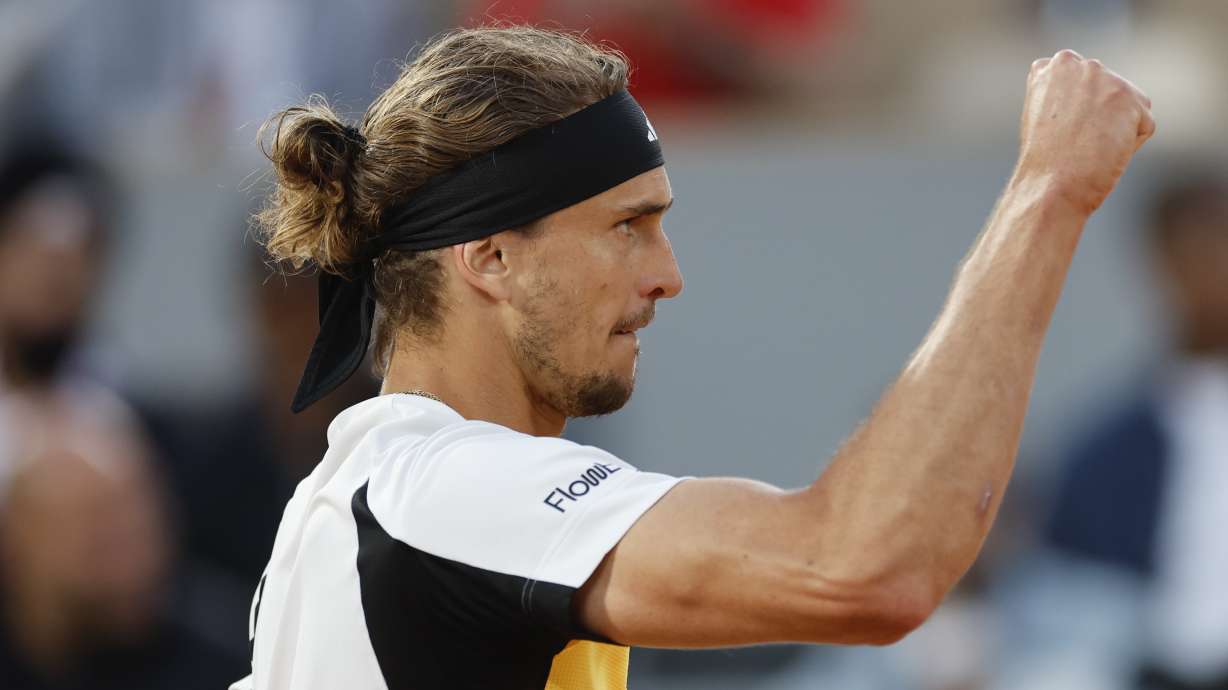 Germany's Alexander Zverev clenches his fist after winning the third set during his semifinal match of the French Open tennis tournament against Norway's Casper Ruud at the Roland Garros stadium in Paris, Friday, June 7, 2024.
