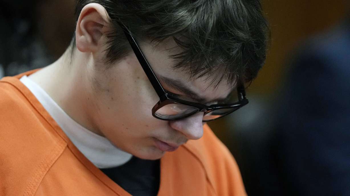 Ethan Crumbley sits in court listening to victim impact statements, Dec. 8, 2023, in Pontiac, Mich. The Michigan teen who was convicted of fatally shooting four students is appealing his life sentence.