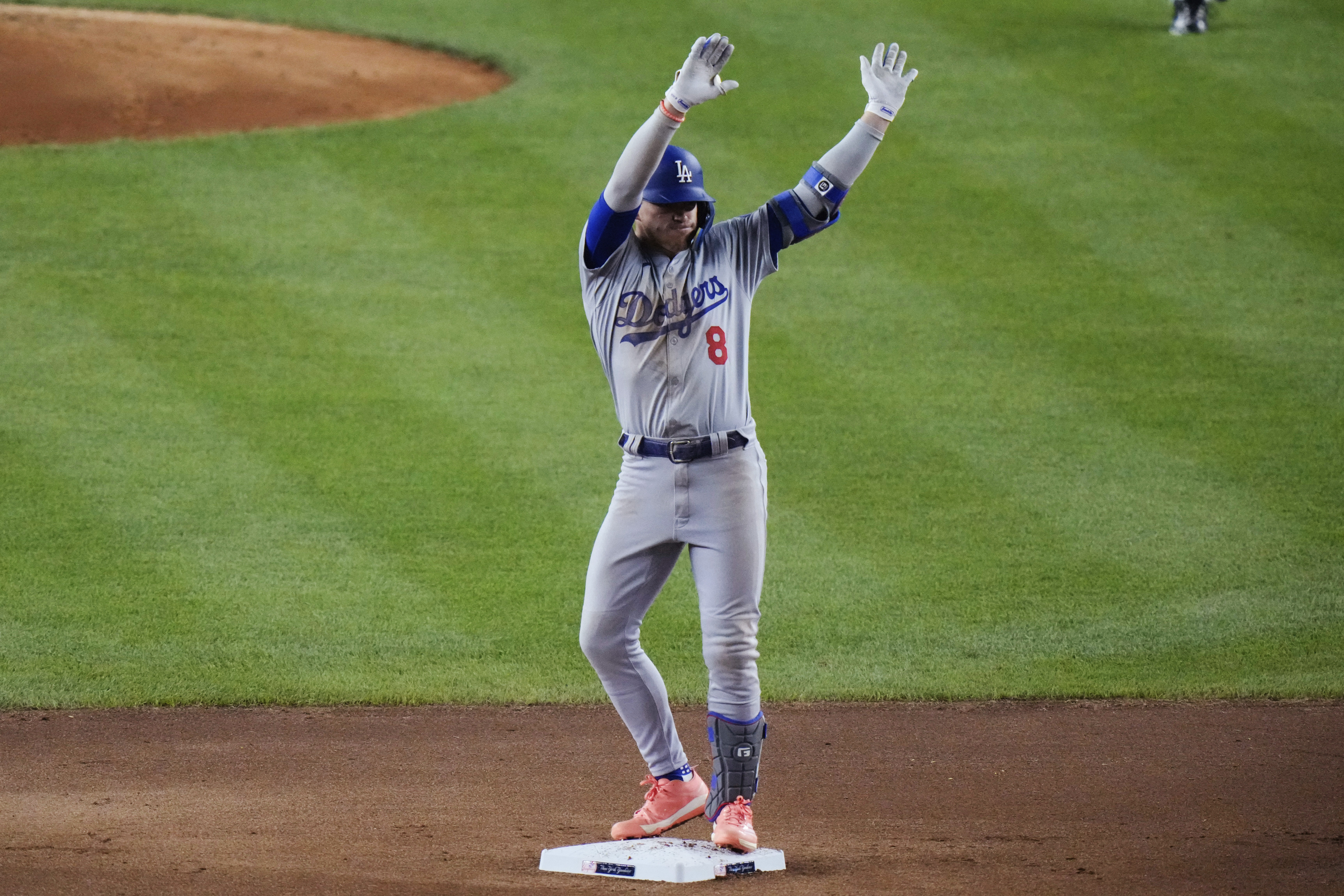 Los Angeles Dodgers' Kiké Hernández (8) gestures to fans after hitting a double during the seventh inning of a baseball game against the New York Yankees, Friday, June 7, 2024, in New York. 