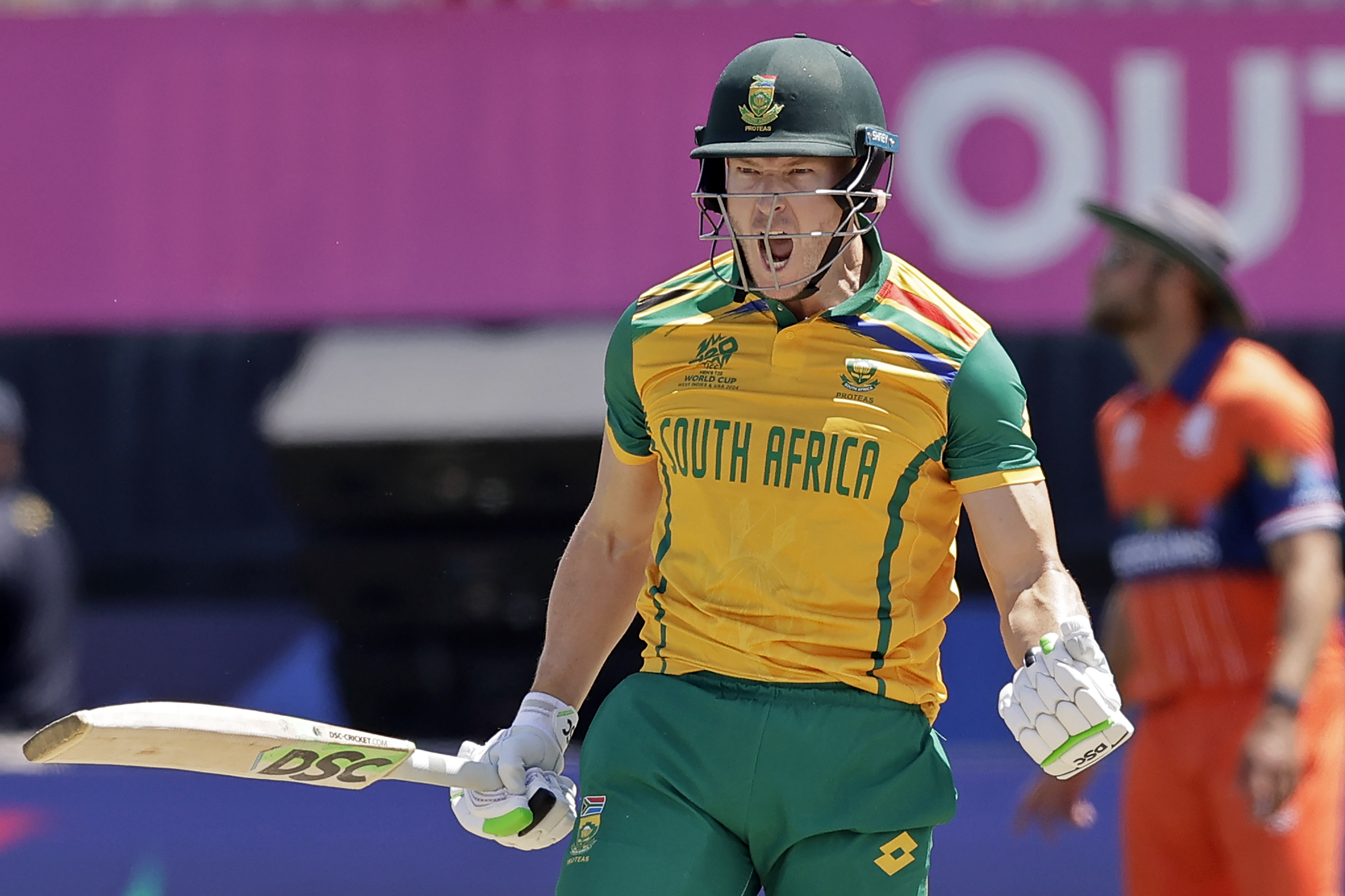 South Africa's David Miller celebrates scoring the winning runs against the Netherlands during an ICC Men's T20 World Cup cricket match at the Nassau County International Cricket Stadium in Westbury, N.Y., Saturday, June 8, 2024.