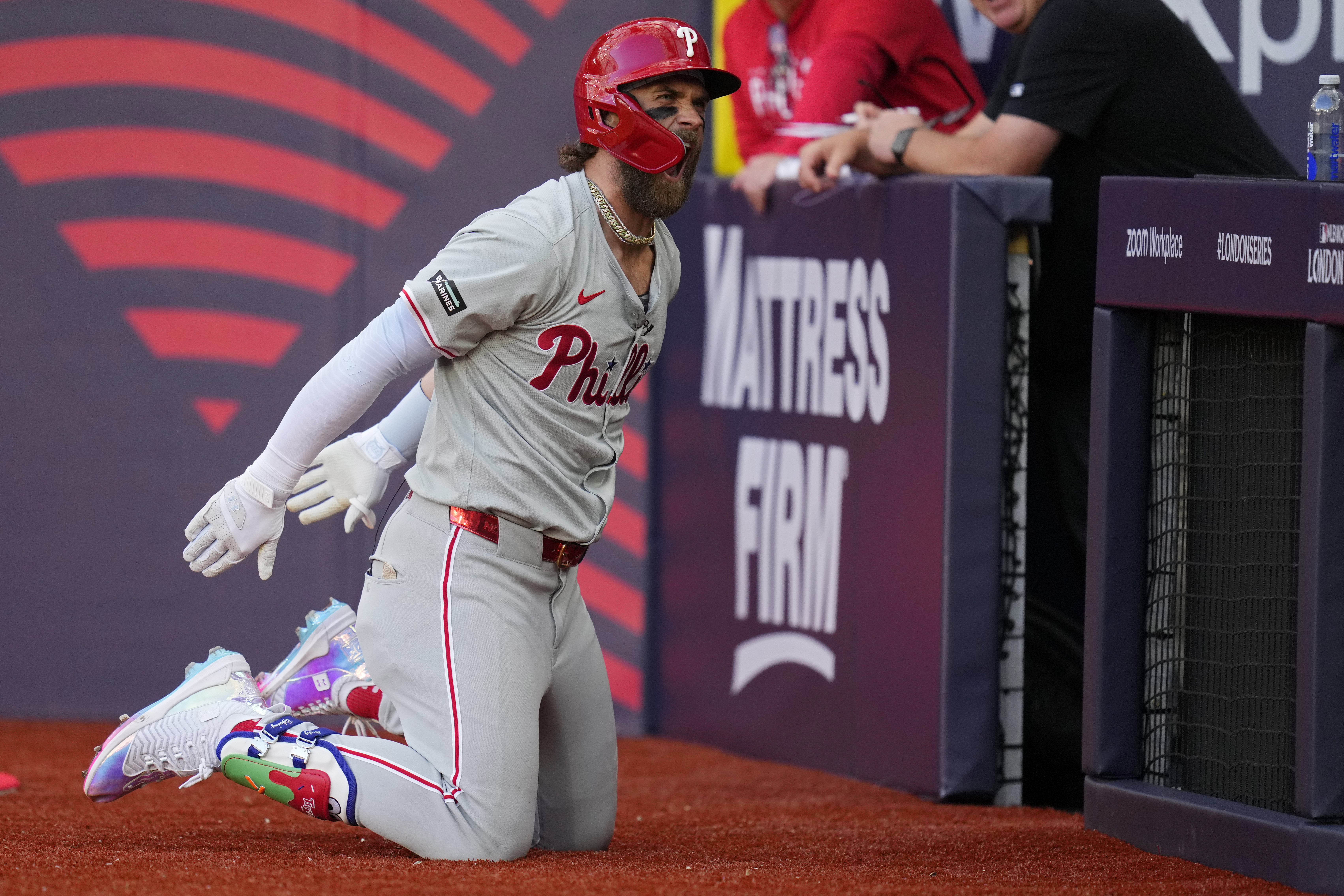 Philadelphia Phillies' Bryce Harper (3) celebrates after hitting a home run against the New York Mets during the fourth inning of a London Series baseball game in London, Saturday, June 8, 2024. 