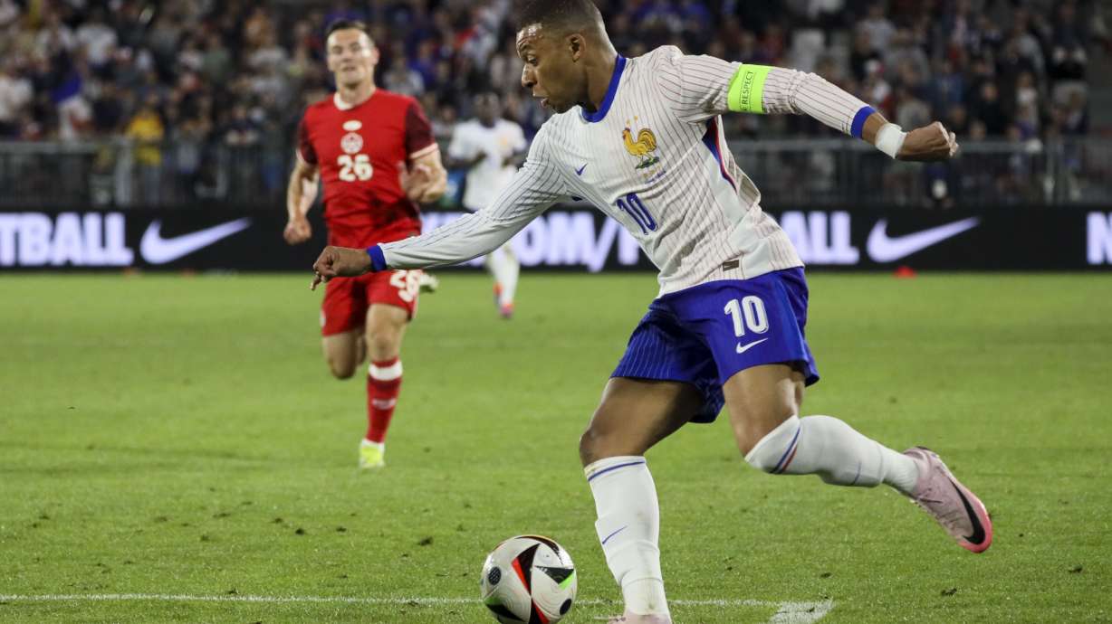 France's Kylian Mbappe controls the ball during the international friendly soccer match between France and Canada at the Matmut Atlantique stadium in Bordeaux, southwestern France, Sunday, June 9, 2024.
