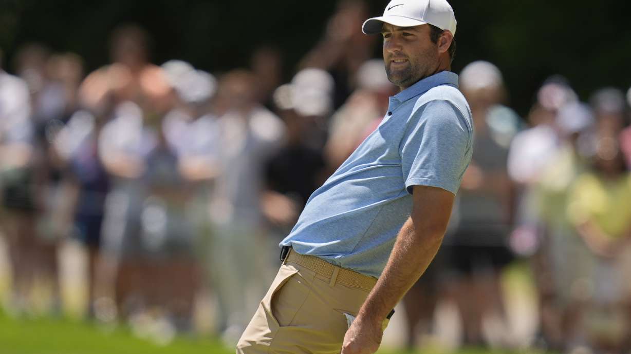 Scottie Scheffler reacts after missing a putt on the second green during the final round of the Memorial golf tournament, Sunday, June 9, 2024, in Dublin, Ohio.