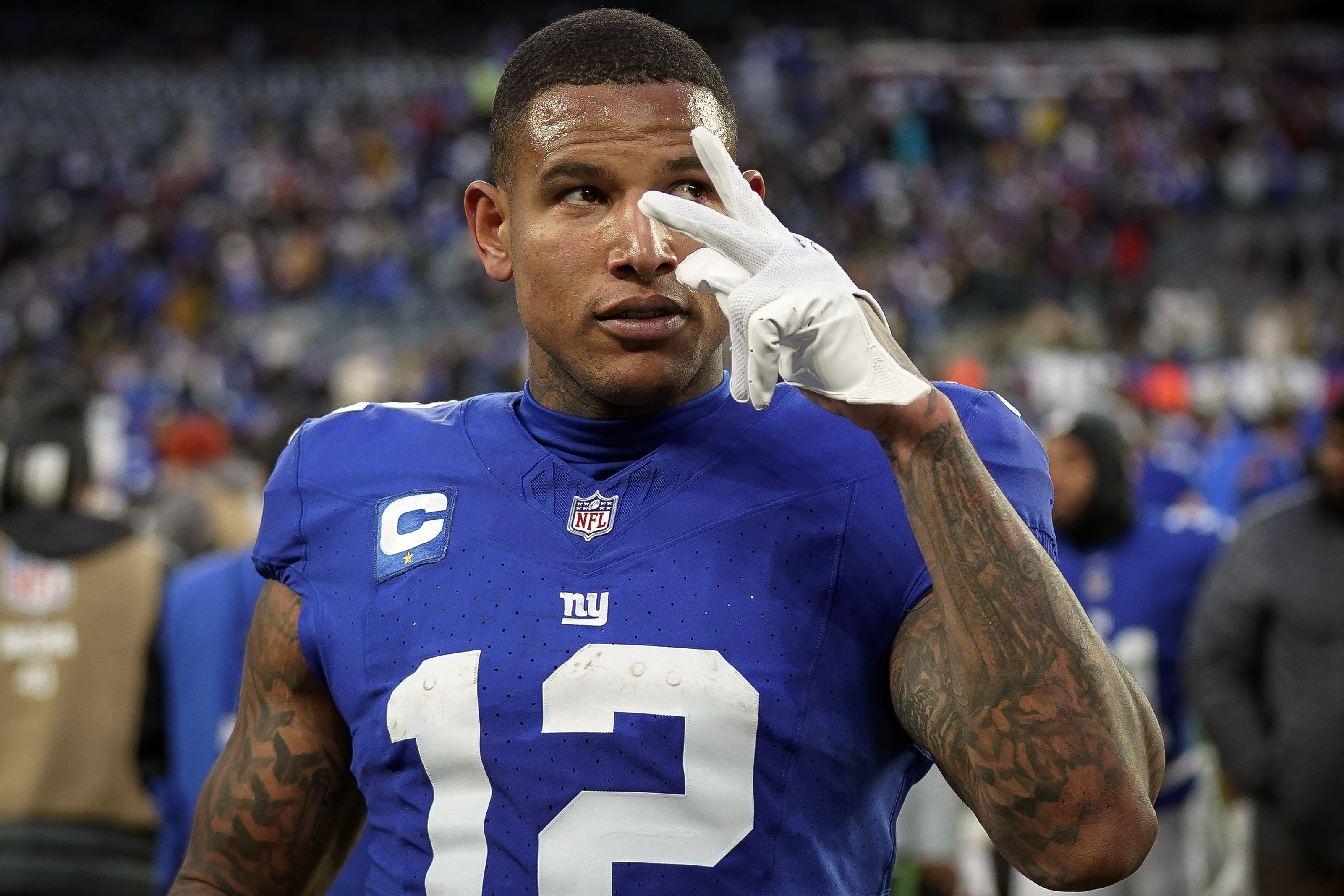 FILE - New York Giants tight end Darren Waller (12) gestures after an NFL football game against the Los Angeles Rams on Sunday, Dec. 31, 2023, in East Rutherford, N.J. Waller announced his retirement from playing football, Sunday, June 9, 2024, saying he “found a lot of joy” in the sport, but "the passion has slowly been fading.”
