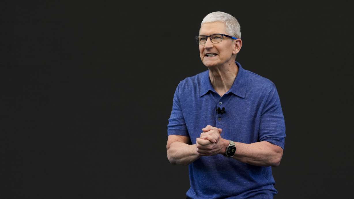 Apple CEO Tim Cook speaks during an announcement of new products on the Apple campus in Cupertino, Calif., Monday. Many of the new features are designed to enhance the Siri assistant and bring artificial intelligence tools to iPhone users.