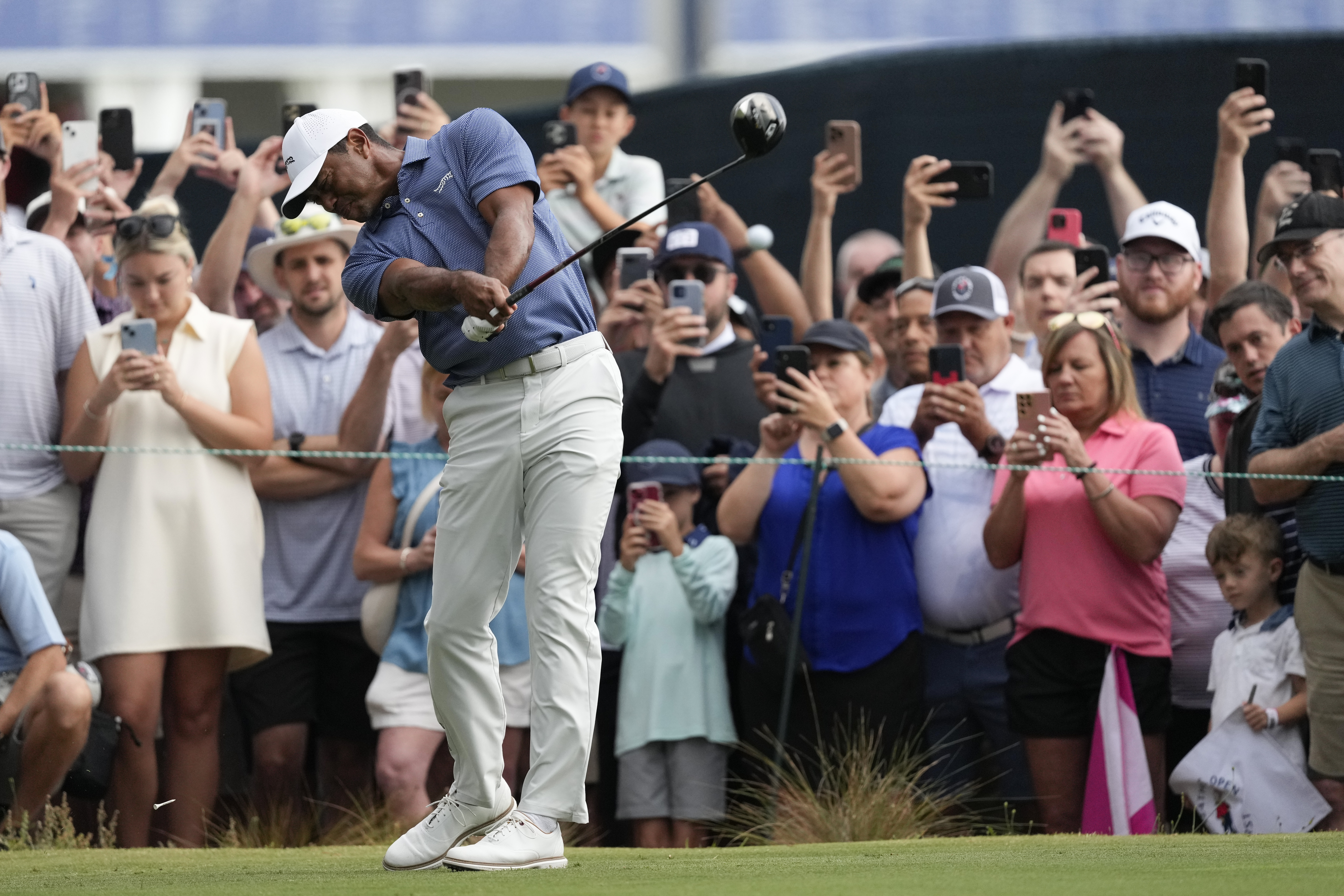 Tiger Woods hits his tee shot on the 13th hole during a practice round for the U.S. Open golf tournament Monday, June 10, 2024, in Pinehurst, N.C. 