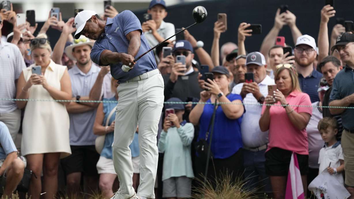 Tiger Woods hits his tee shot on the 13th hole during a practice round for the U.S. Open golf tournament Monday, June 10, 2024, in Pinehurst, N.C.