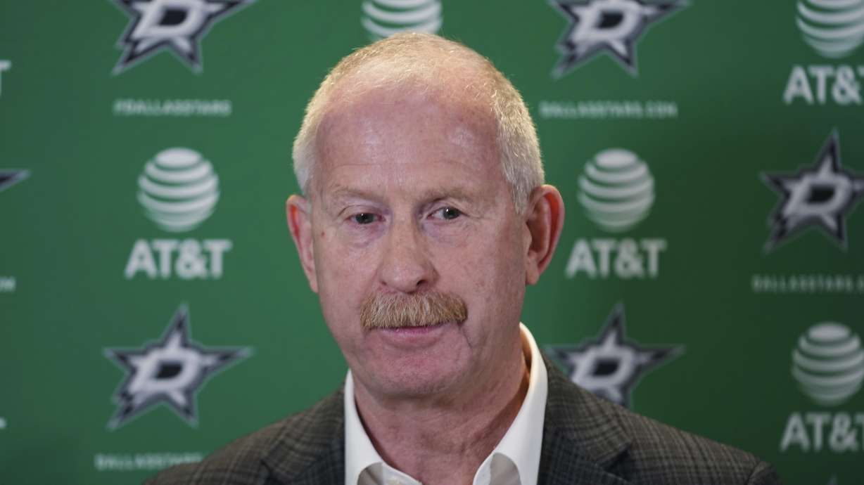 FILE - Dallas Stars general manager Jim Nill speaks to reporters during a news conference at the NHL hockey team's practice facility in Frisco, Texas, June 8, 2023. Ken Holland and Nill were teammates in junior hockey nearly a half-century ago with big aspirations as players. Their names are together on the Stanley Cup four times, not as players but rather for their front-office roles with the Red Wings during Detroit's run of championships from 1997-2008. Now they are general managers of opposing teams in the Western Conference finals, old friends both hoping to get to another Stanley Cup.