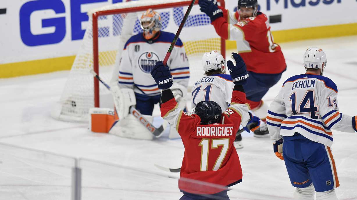 Florida Panthers center Evan Rodrigues (17) celebrates after scoring during the third period of Game 2 of the NHL hockey Stanley Cup Finals against the Edmonton Oilers, Monday, June 10, 2024, in Sunrise, Fla.