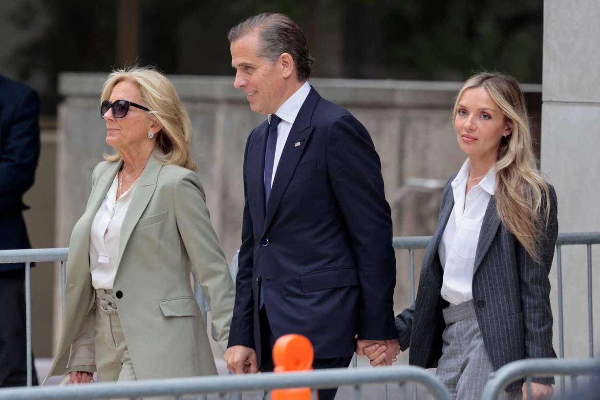 Hunter Biden, center, son of President Joe Biden, his wife Melissa Cohen Biden, right, and first lady Jill Biden leave the federal court after the jury finds him guilty on all three counts in his trial on criminal gun charges, in Wilmington, Del., Tuesday.