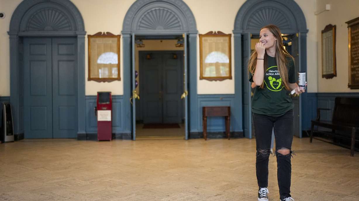 Lilly Wasilnak, a survivor of the 2012 Sandy Hook Elementary School shooting, arrives at a rally against gun violence on June 7 in Newtown, Conn.
