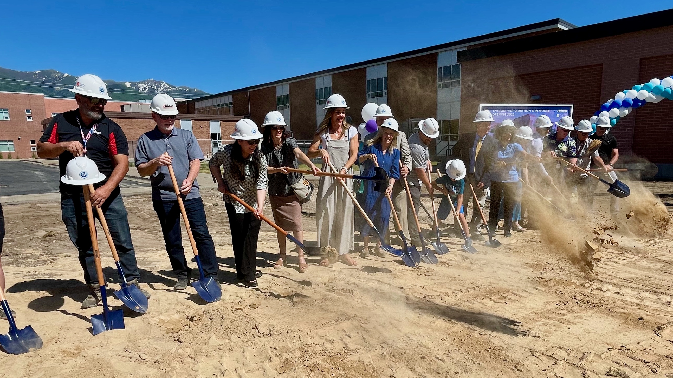 Officials from Davis School District and Layton High School and others ceremonially break ground Tuesday on a planned addition to Layton High.