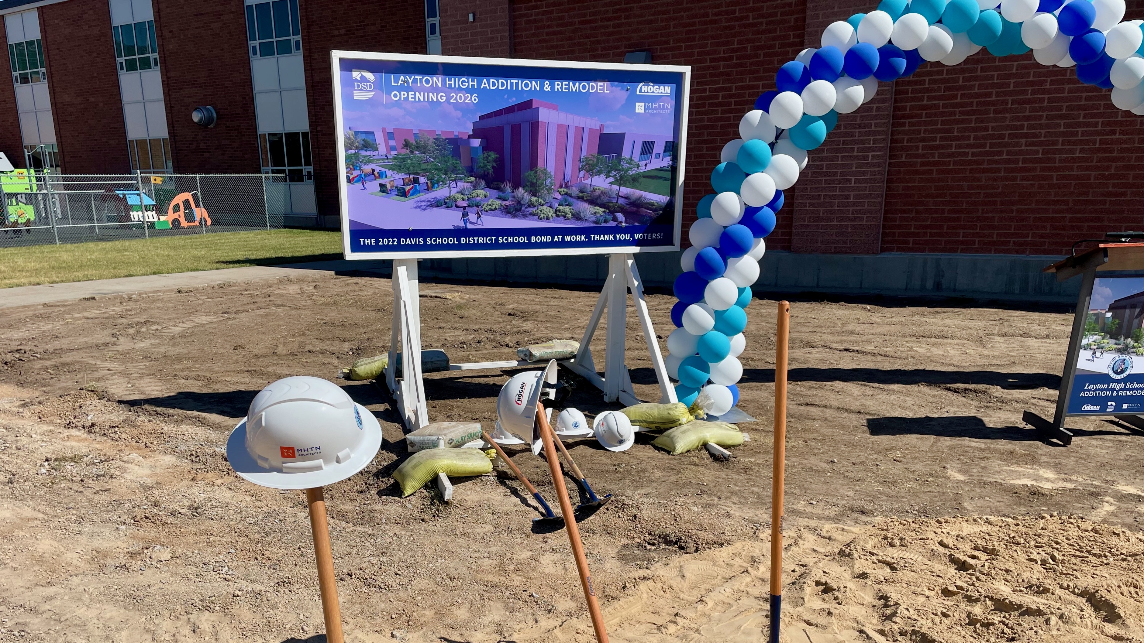 Officials from Davis School District and Layton High School and others ceremonially break ground Tuesday on a planned addition to Layton High.