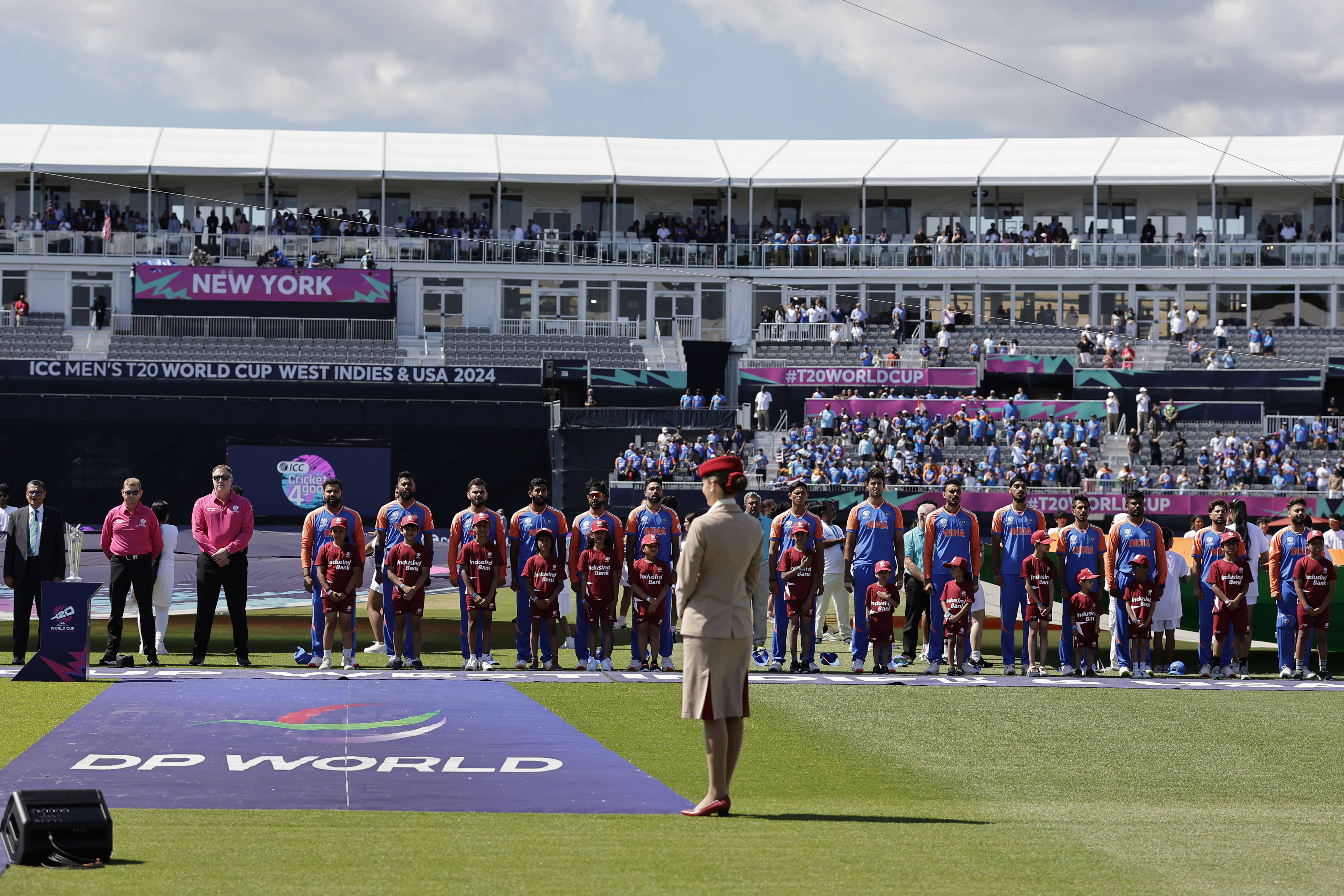 Players of team India stand for their national anthem before the start of the ICC Men's T20 World Cup cricket match between United States and India at the Nassau County International Cricket Stadium in Westbury, New York, Wednesday, June 12, 2024.
