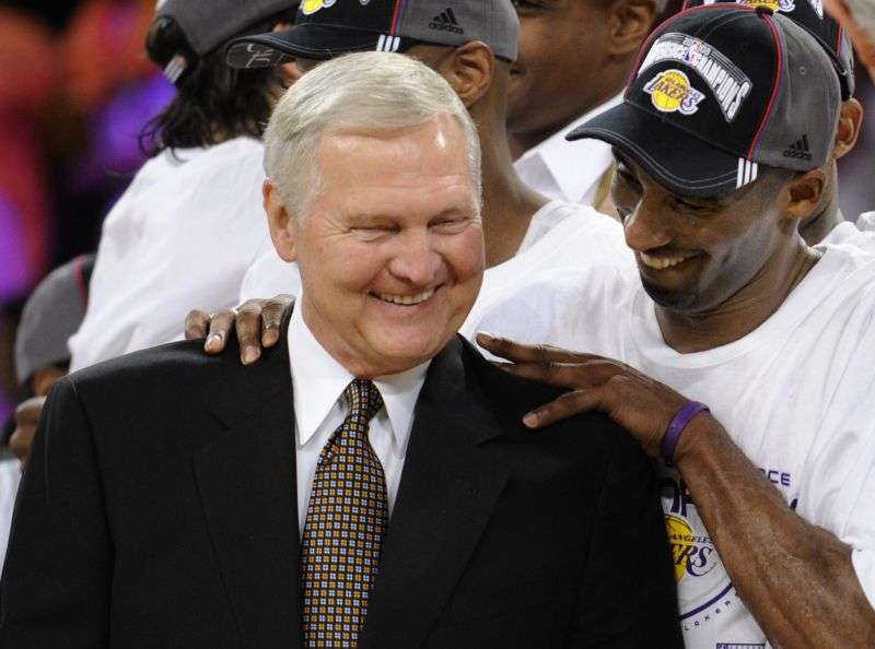 Los Angeles Lakers' Kobe Bryant gives basketball great Jerry West a shoulder rub after the Lakers beat the San Antonio Spurs in Game 5 of the NBA Western Conference basketball finals in Los Angeles, May 29, 2008. West died Wednesday morning, the Los Angeles Clippers announced. He was 86.