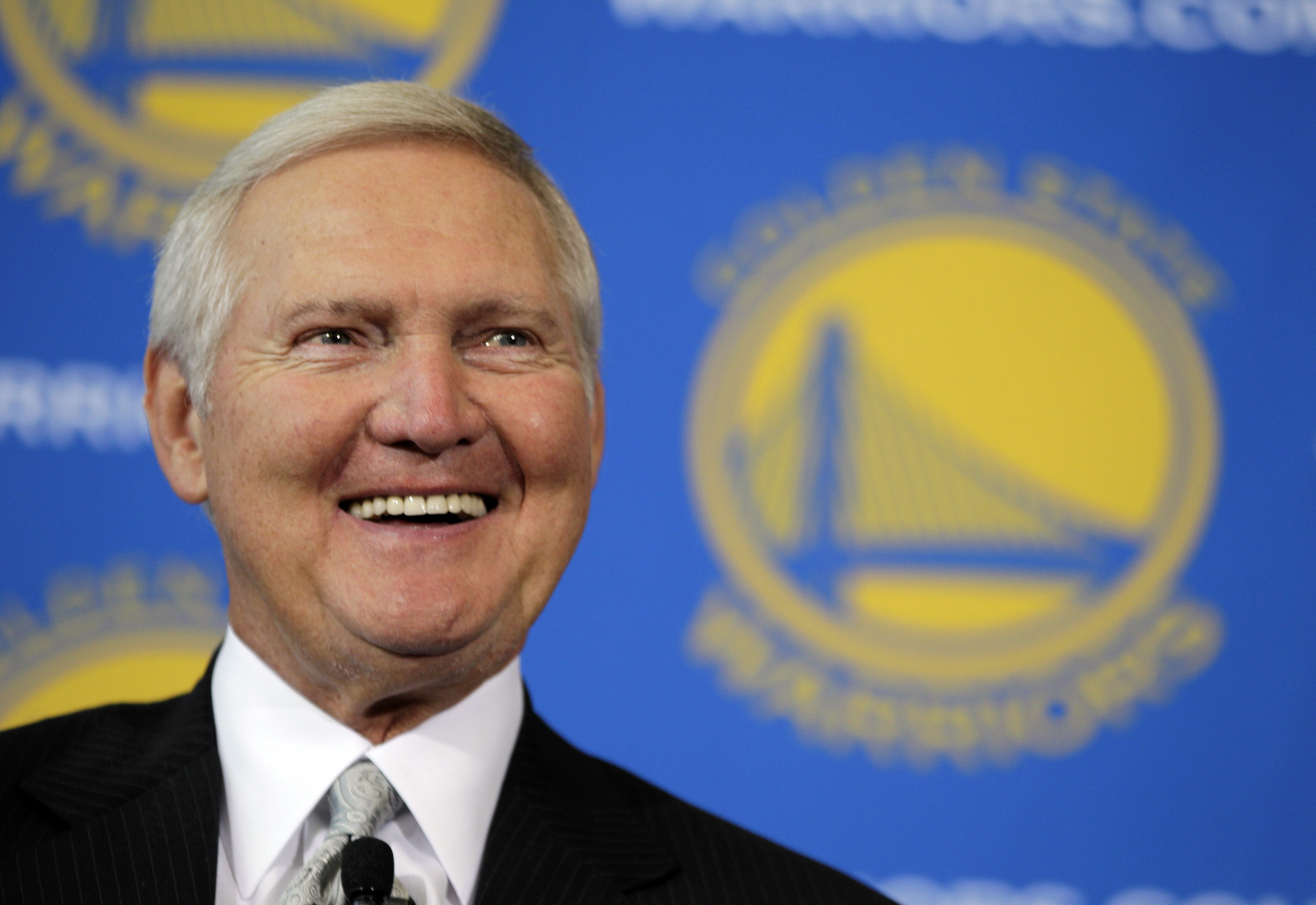 FILE - Jerry West smiles after being introduced as a new member of the Golden State Warriors basketball club's Executive Board, during a news conference in San Francisco, May 24, 2011. Jerry West, who was selected to the Basketball Hall of Fame three times in a legendary career as a player and executive and whose silhouette is considered to be the basis of the NBA logo, died Wednesday morning, June 12, 2024, the Los Angeles Clippers announced. He was 86. 