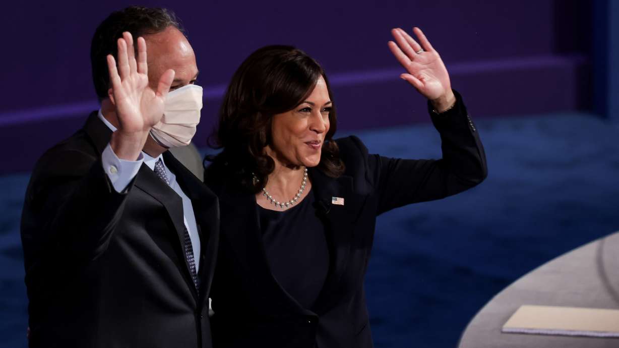 Then-vice presidential candidate Sen. Kamala Harris and her husband, Douglas Emhoff, at a debate at Kingsbury Hall at the University of Utah in Salt Lake City on Oct. 7, 2020. Harris will visit Utah in June, two people with knowledge of the plans said.