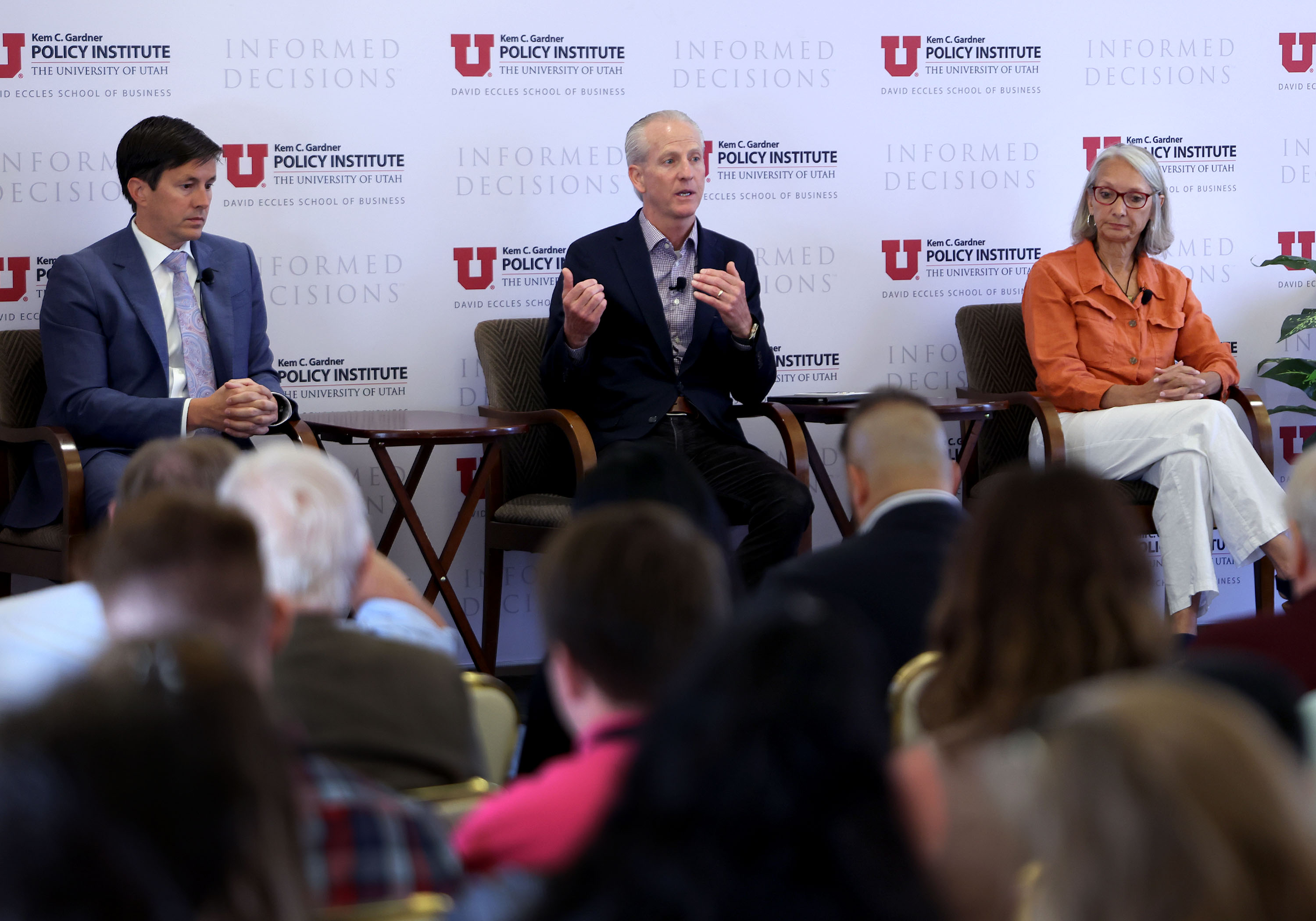 Sen. Kirk Cullimore, Wayne Niederhauser, Utah Homeless Services Board, and Carol Hollowell, executive director of homeless services provider Switchpoint, speak during a Gardner Institute Newsmaker Breakfast on homelessness in Salt Lake City on Wednesday.