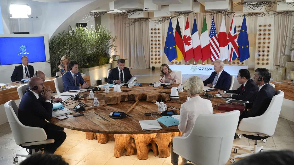 From left, European Council President Charles Michel, German Chancellor Olaf Scholz, Canada's Prime Minister Justin Trudeau, French President Emmanuel Macron, Italian Prime Minister Giorgia Meloni, U.S. President Joe Biden, Japan's Prime Minister Fumio Kishida, Britain's Prime Minister Rishi Sunak and European Commission President Ursula von der Leyen participate in a working session at the G7, Thursday, in Borgo Egnazia, Italy.