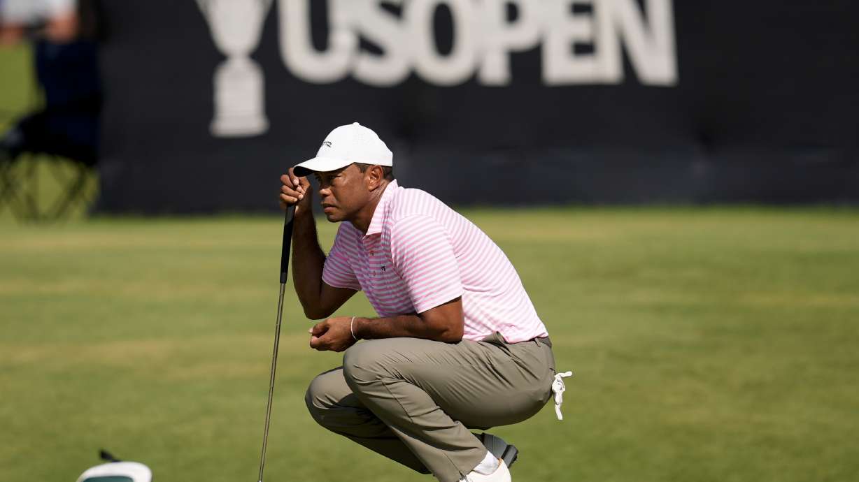 Tiger Woods lines up a putt on the 16th hole during the first round of the U.S. Open golf tournament Thursday, June 13, 2024, in Pinehurst, N.C.