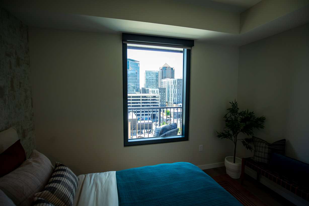 A view of downtown Salt Lake City from a bedroom window inside The Worthington Residences. The apartment high-rise opened this month.