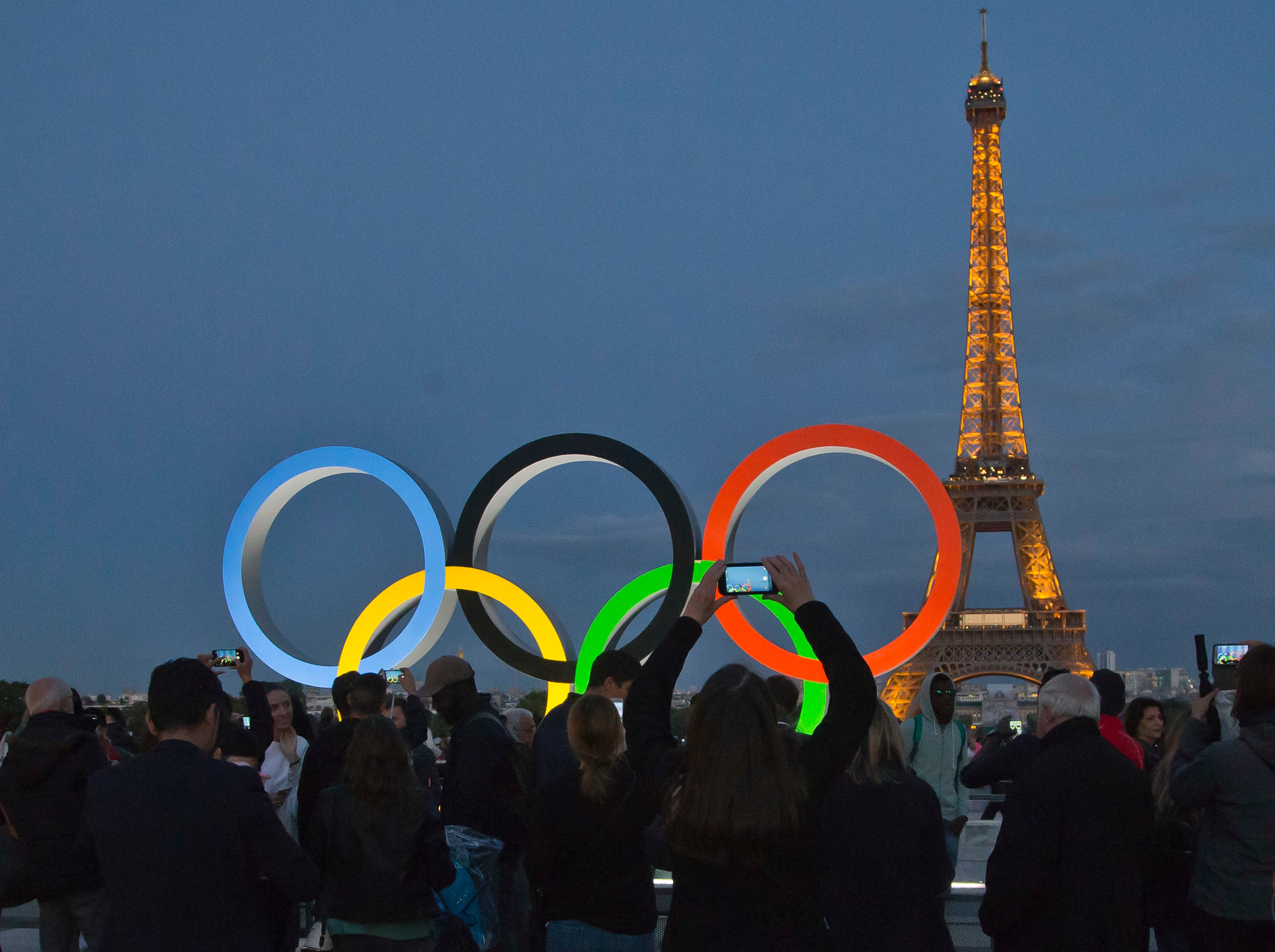 The Olympic rings are set up on Trocadero plaza that overlooks the Eiffel Tower in Paris, France, Sept. 14, 2017. France's bid for the 2030 Winter Games has stalled temporarily,