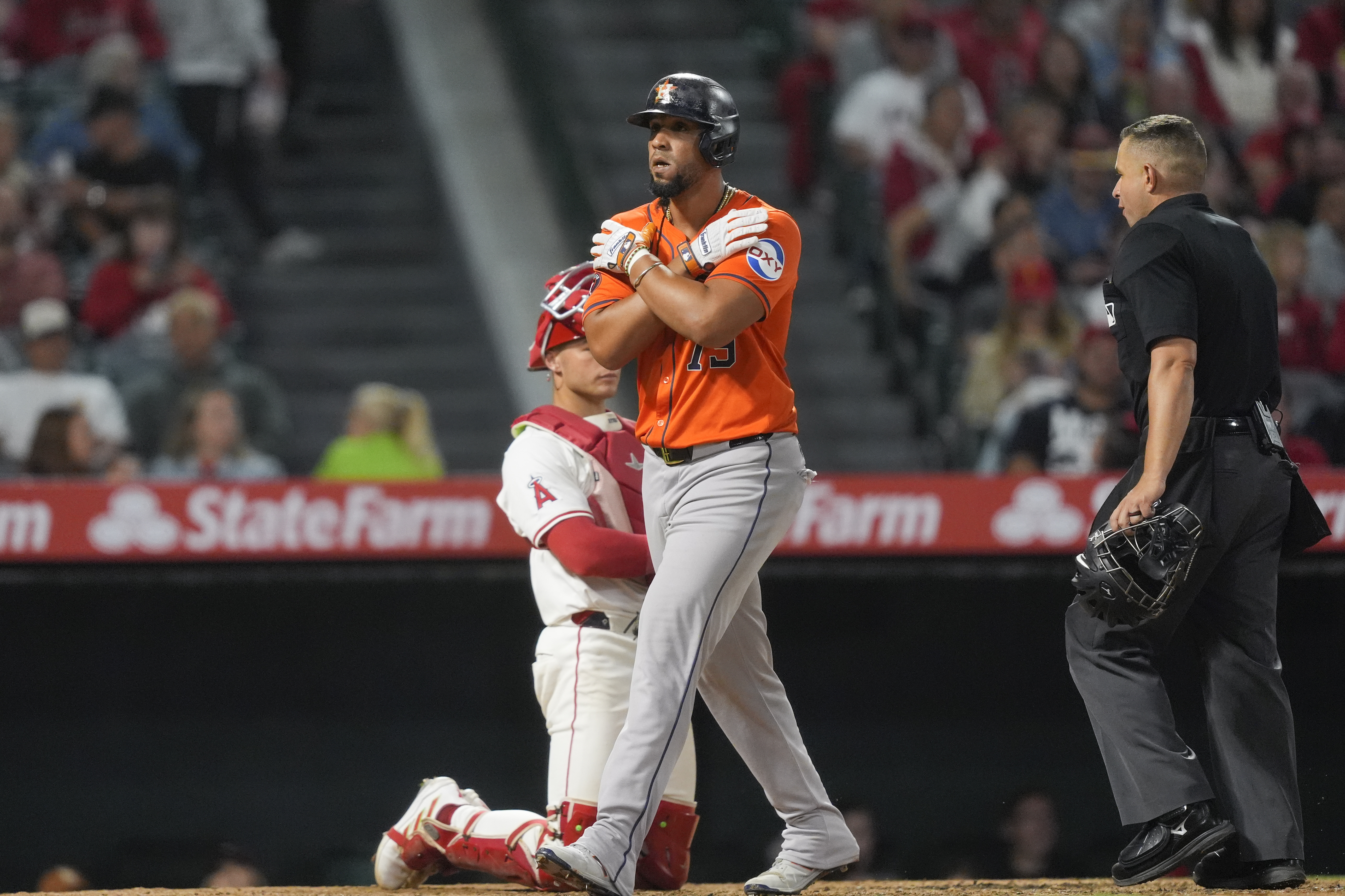 Houston Astros' Jose Abreu celebrates his solo home run during the eighth inning of a baseball game against the Los Angeles Angels, Friday, June 7, 2024, in Anaheim, Calif. 