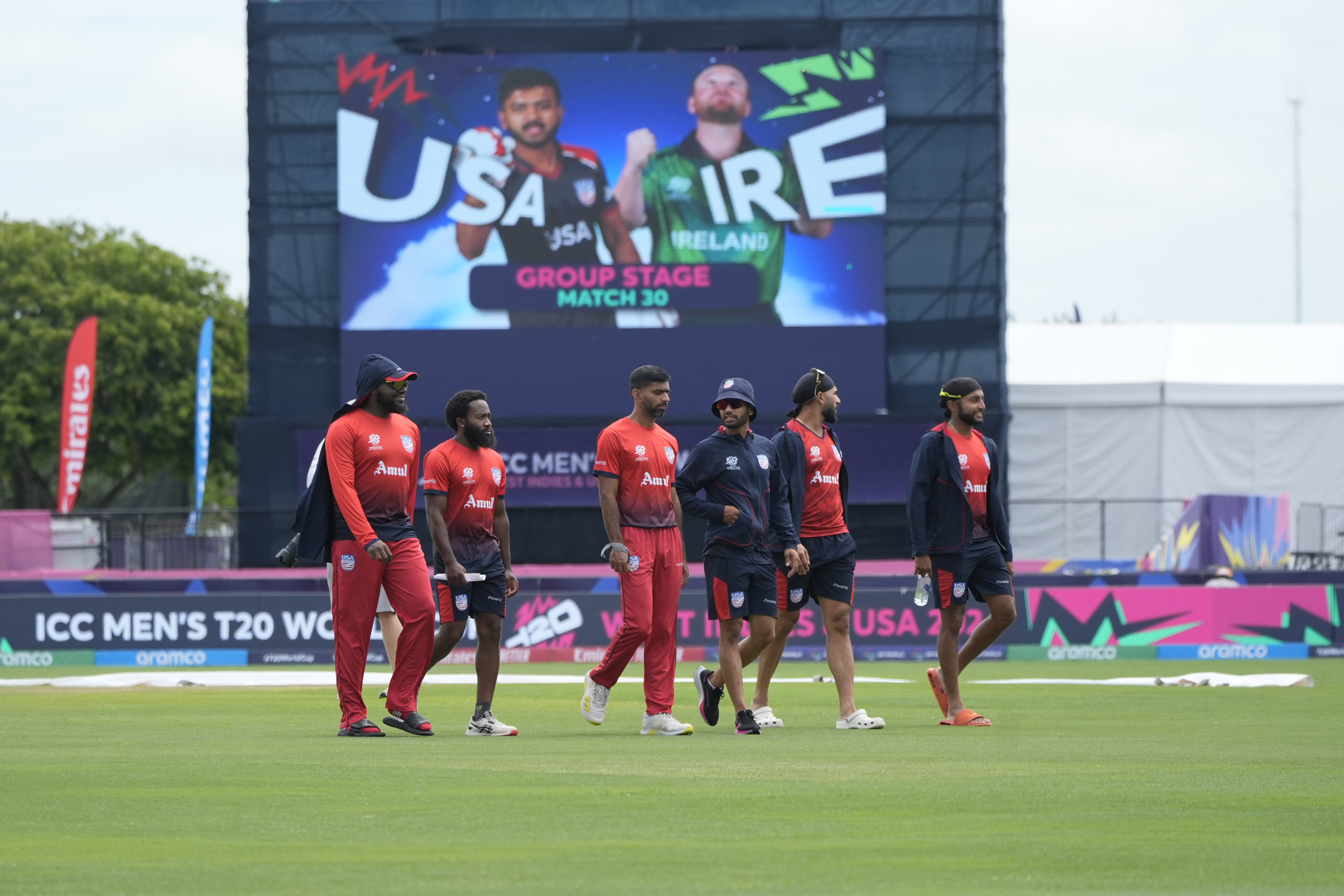 Team United States' cricketers walk in the field before an ICC Men's T20 World Cup cricket match between the United States and Ireland at the Central Broward Regional Park Stadium in Lauderhill, Fla., Friday, June 14, 2024. 