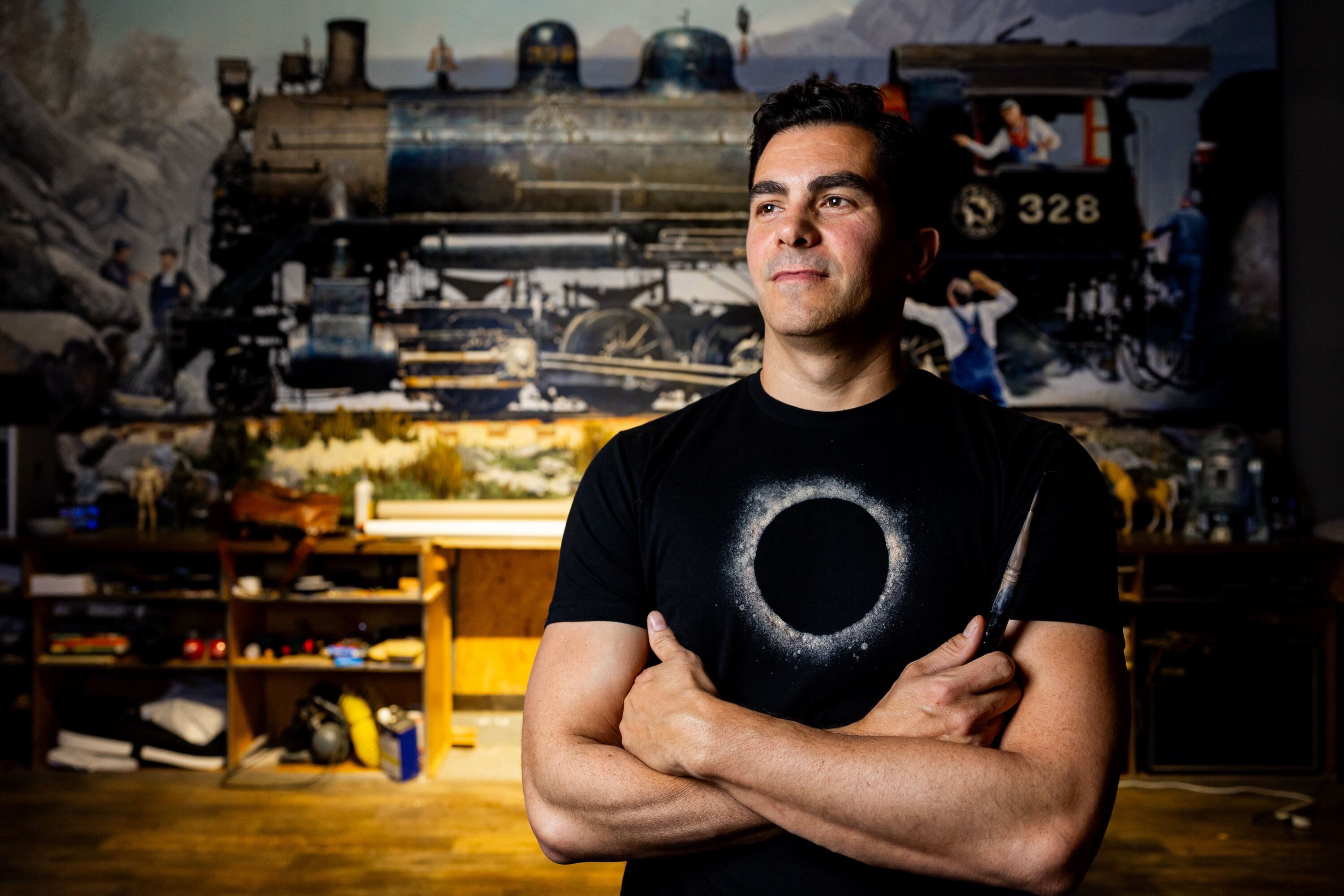 Santiago Michalek poses for a portrait in his studio at his home in Highland on June 7. In 2020, the U.S. Bureau of Labor Statistics recorded 2.6 million artists in the workforce.