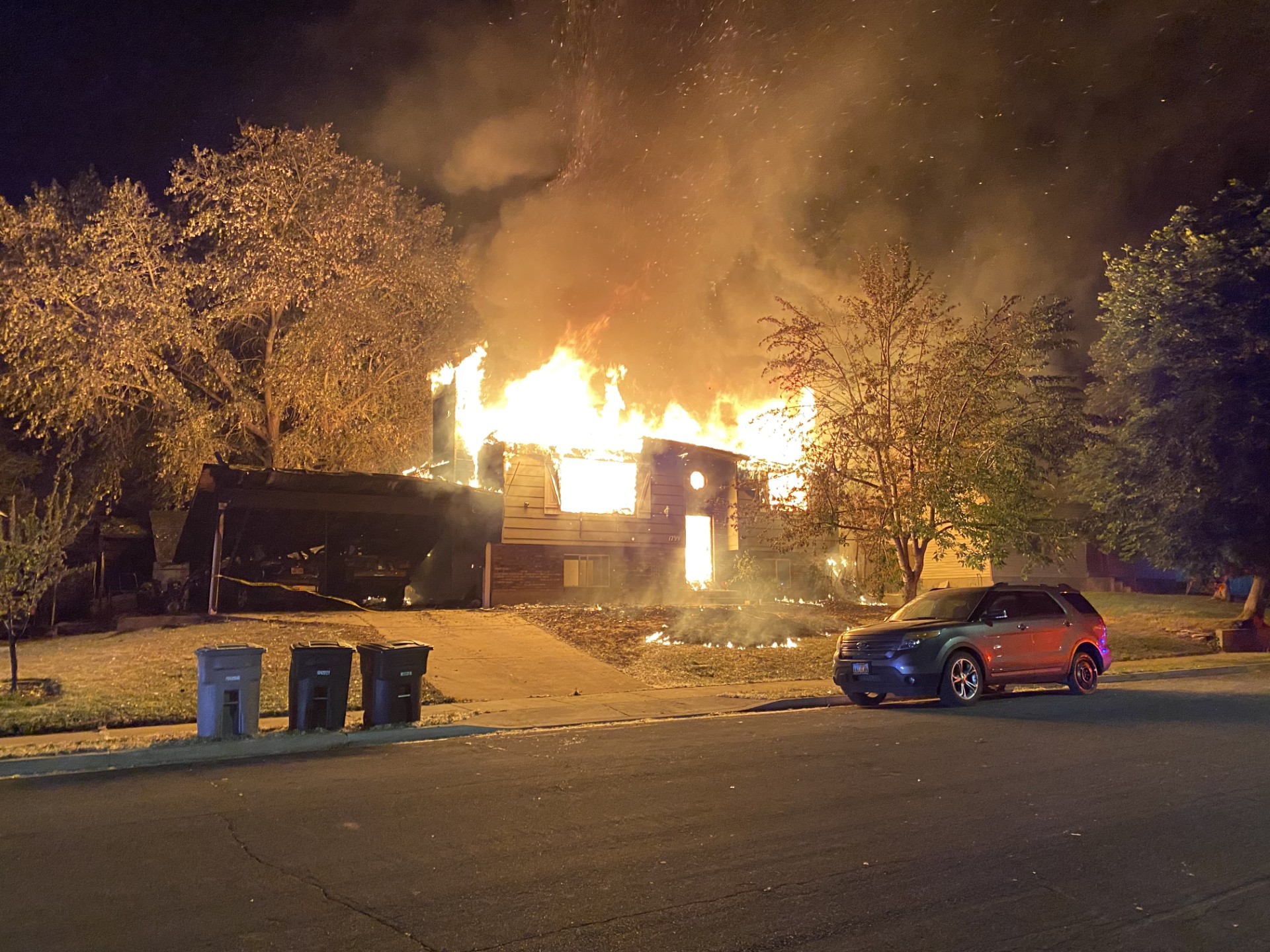 The house caught fire again later Friday night.