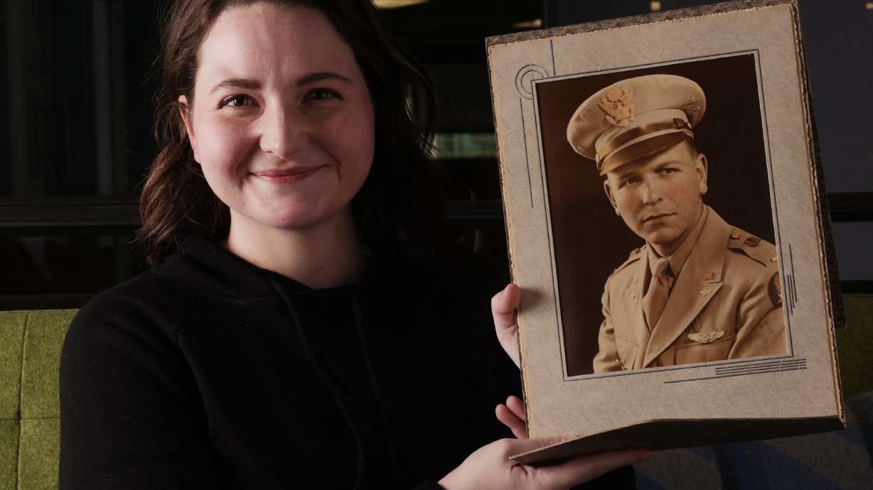 Camille Noel holds a photo of a World War II hero from Utah, Jack Lundberg, in Salt Lake City on May 9. Noel is spearheading a project to recognize Lundberg, who was part of the Normandy invasion.