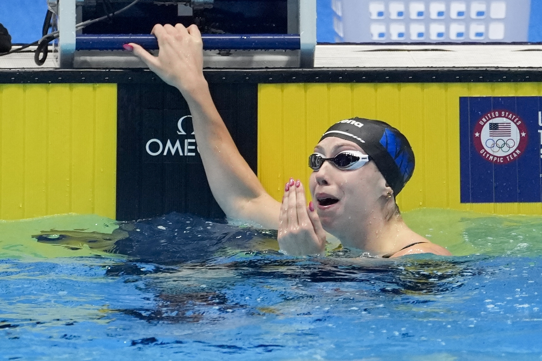 Gretchen Walsh reacts to her world record in her Women's 100 butterfly semifinals heat Saturday, June 15, 2024, at the US Swimming Olympic Trials in Indianapoils.