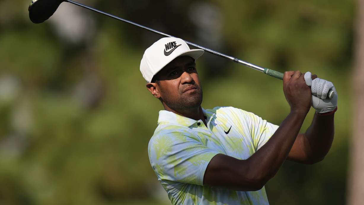 Tony Finau watches his tee shot on the 11th hole during the third round of the U.S. Open golf tournament Saturday, June 15, 2024, in Pinehurst, N.C.