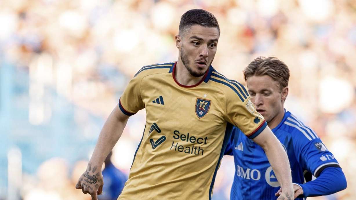 Alex Katranis, left, dribbles away from a Montreal defender.