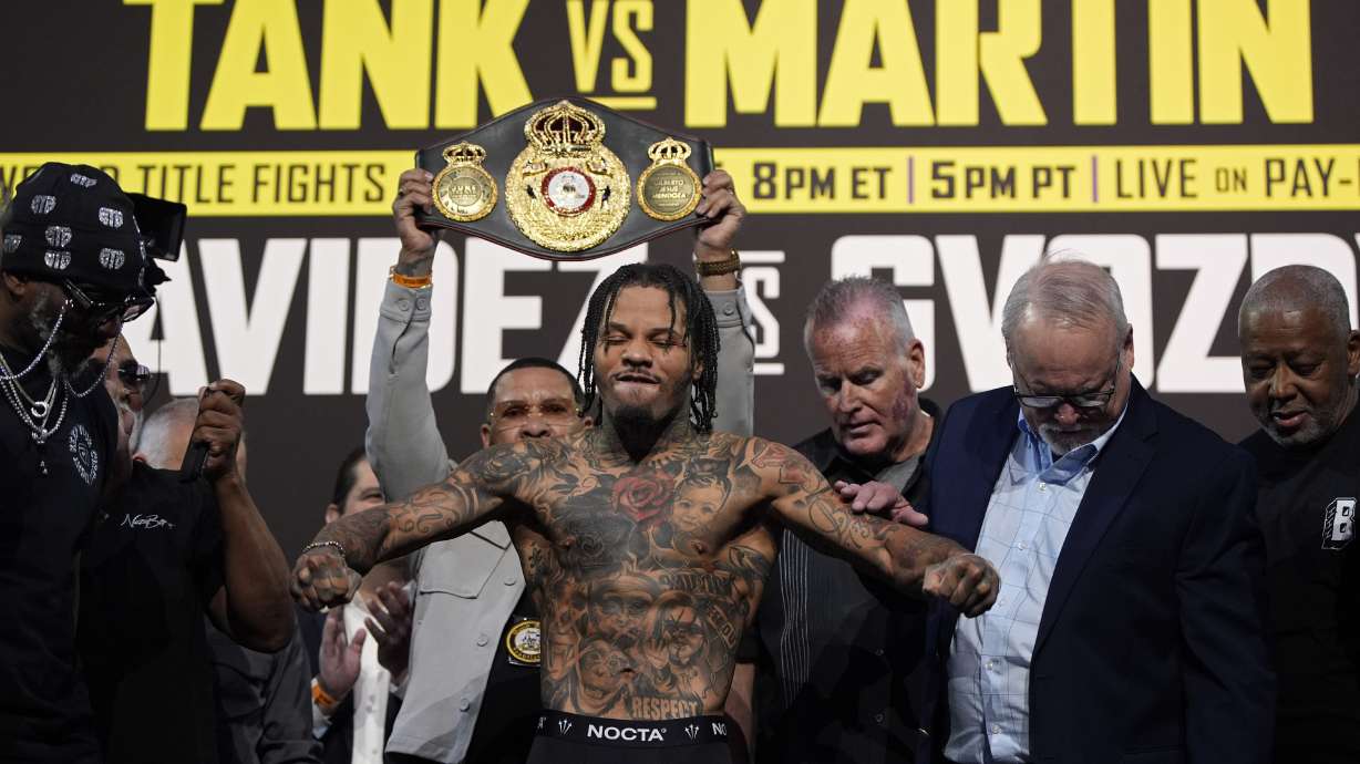 Gervonta Davis poses on the scale during a weigh-in Friday, June 14, 2024, in Las Vegas. Davis is scheduled to fight Frank Martin in a WBA lightweight championship fight Saturday in Las Vegas.