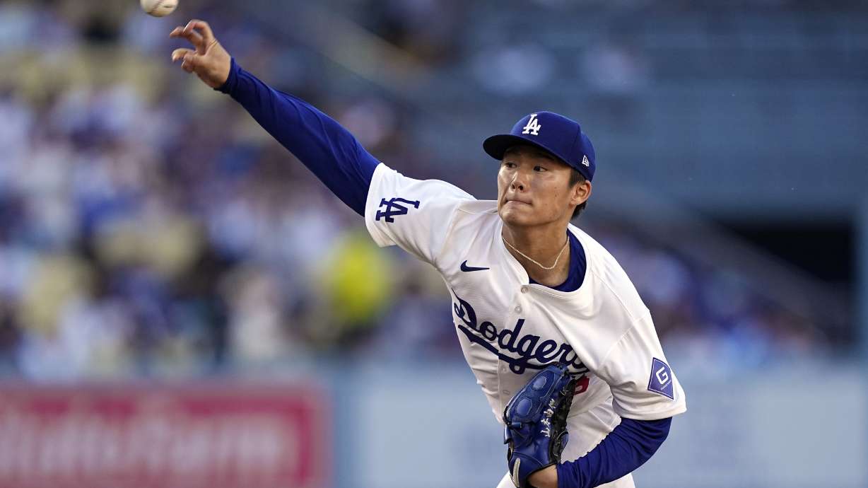 Los Angeles Dodgers starting pitcher Yoshinobu Yamamoto throws to the plate during the first inning of a baseball game against the Kansas City Royals Saturday, June 15, 2024, in Los Angeles.