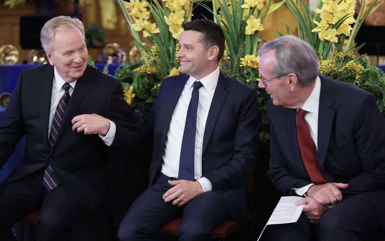 Lloyd Newell, Derrick Porter and President Michael O. Leavitt talk as they announce Porter as the new voice of the Tabernacle Choir at Temple Square in Salt Lake City on Friday. Porter’s first "Music & the Spoken Word" broadcast will be on June 23.