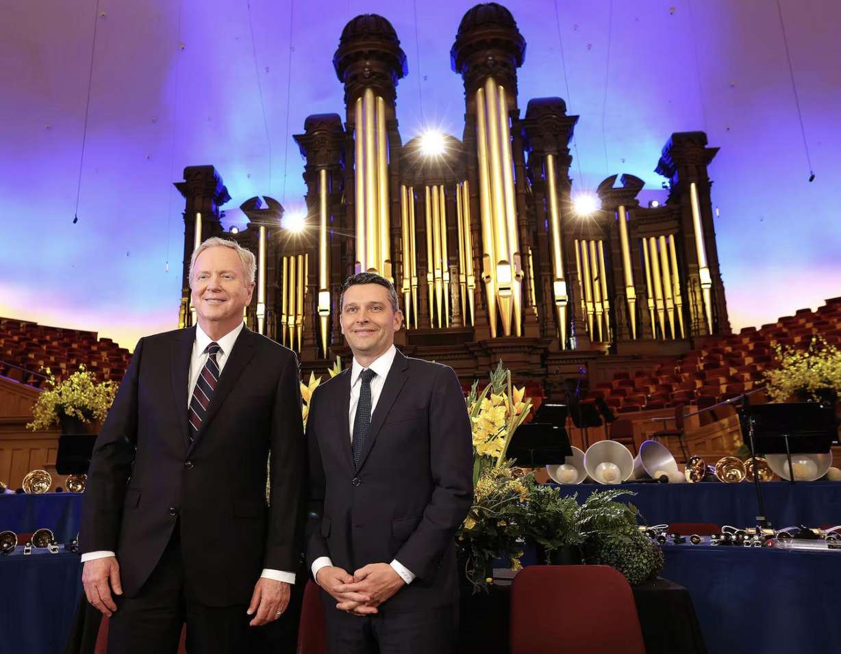 Lloyd Newell and Derrick Porter stand together as Porter is announced as the new voice of the Tabernacle Choir at Temple Square in Salt Lake City on Friday. Porter’s first "Music & the Spoken Word" broadcast will be on June 23.