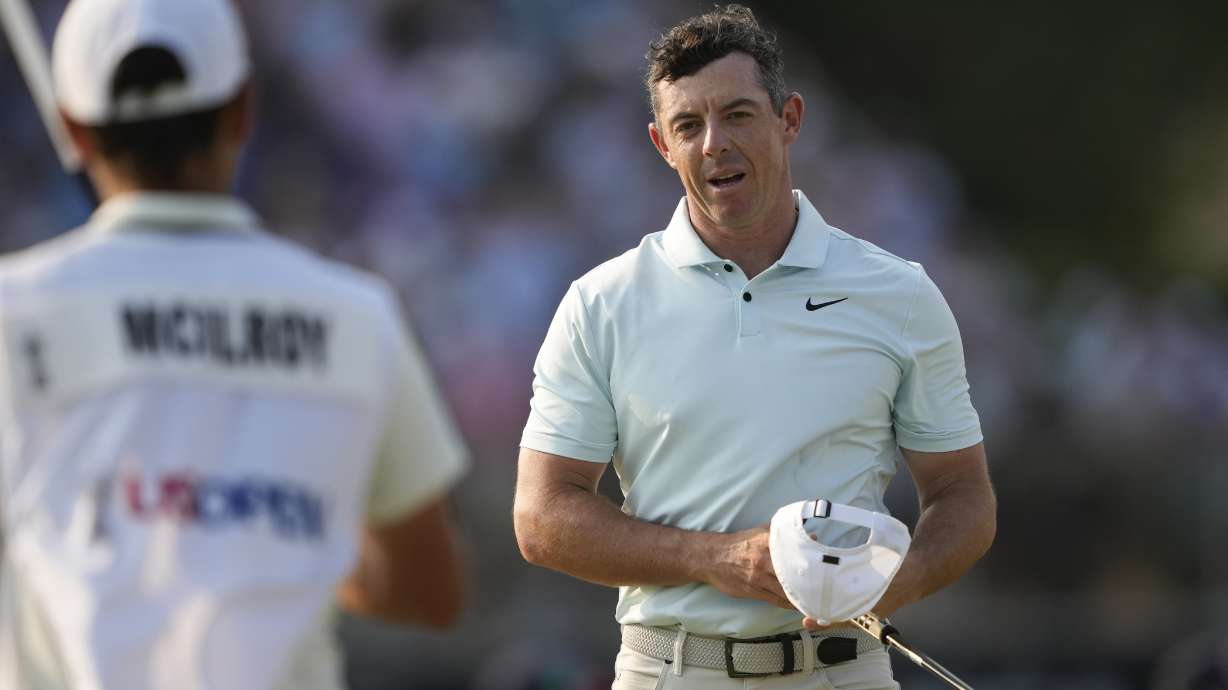 Rory McIlroy, of Northern Ireland, reacts after missing a putt on the 18th hole during the final round of the U.S. Open golf tournament Sunday, June 16, 2024, in Pinehurst, N.C.