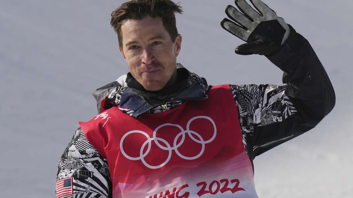 FILE - Shaun White waves after competing in the men's halfpipe finals at the Winter Olympics, Feb. 11, 2022, in Zhangjiakou, China. White is starting a season-long halfpipe league that will offer $1.5 million in prizes in hopes of pulling together what has long been a spread-out, confusing action-sports calendar.