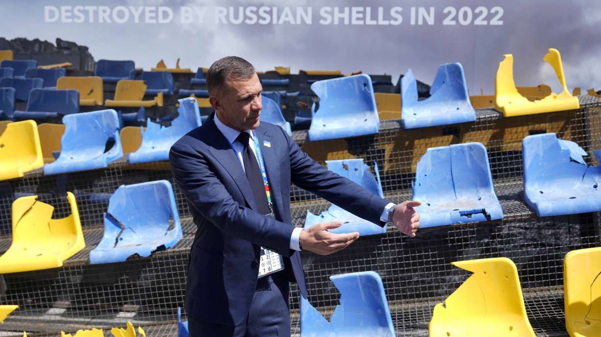Andriy Shevchenko, Ukrainian football legend and UAF President, presents an installation ahead of the Group E match between Romania and Ukraine at the Euro 2024 soccer tournament in Munich, Germany, Monday, June 17, 2024. A poignant installation has been unveiled ahead of Ukraine’s first match at the European Championship. A destroyed stand from Kharkiv’s Sonyachny stadium that was built for Euro 2012 has been displayed in a square in Munich ahead of the team’s opener against Romania.